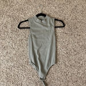 Green body suit in a size small.